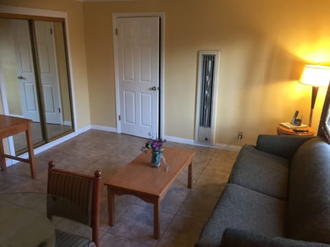 Executive Suite, Multiple Beds | Living area | TV