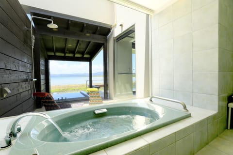 Suite, Bathtub, Ocean View | Bathroom | Combined shower/tub, deep soaking tub, free toiletries, hair dryer