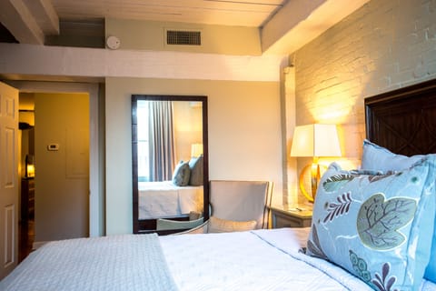 Suite, 1 Queen Bed (Street View) - Stair Access Only | Egyptian cotton sheets, premium bedding, pillowtop beds, in-room safe