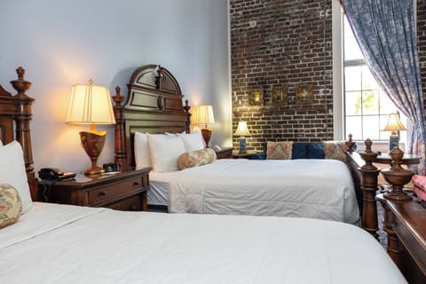 Deluxe Room, 2 Queen Beds | In-room safe, individually decorated, individually furnished, desk