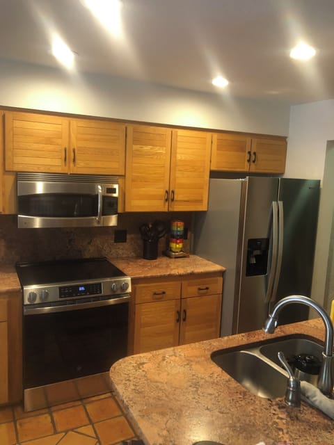 Large brand new stove and refrigerator Kitchen is well equipped