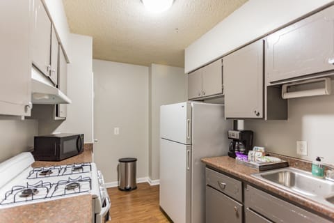 Apartment, 1 Bedroom, River View | Private kitchen | Full-size fridge, microwave, oven, stovetop