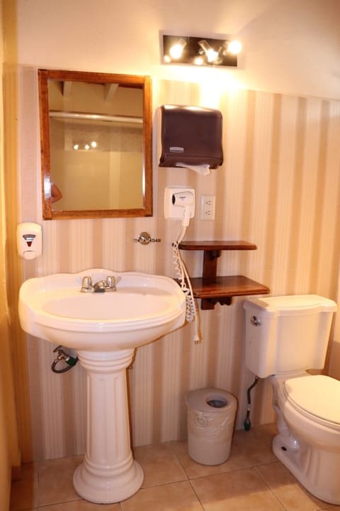 Superior Room | Bathroom | Shower, rainfall showerhead, hair dryer, towels