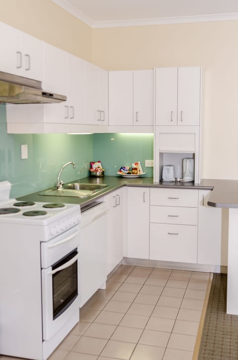 Deluxe Apartment, 2 Bedrooms | Private kitchen | Fridge, microwave, coffee/tea maker, electric kettle