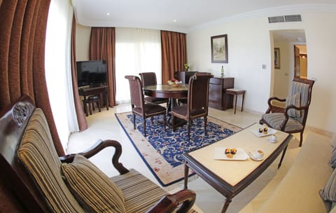 Superior Suite, Sea View | Living room | 64-inch LCD TV with cable channels, TV, table tennis