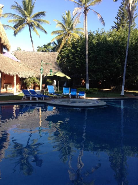 Outdoor pool, pool umbrellas, sun loungers