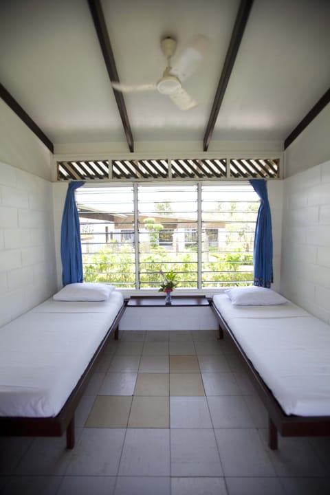 Economy Room, 2 Twin Beds, Courtyard Area | In-room safe, individually furnished, laptop workspace