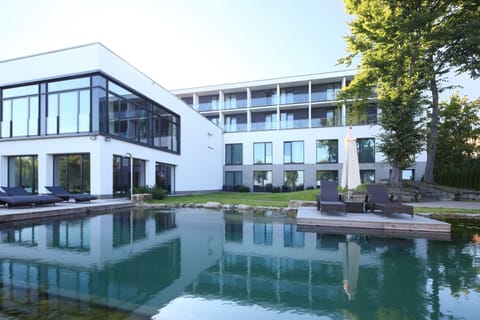 Indoor pool, outdoor pool, pool umbrellas, sun loungers