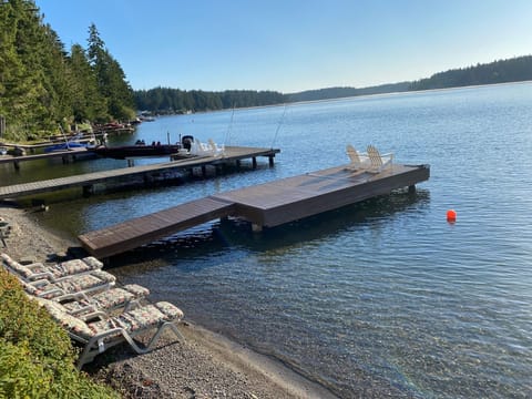 Private beach and deep water dock for home.  Dock depth supports any sized boat
