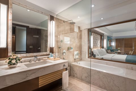 Junior Suite | Bathroom | Designer toiletries, hair dryer, slippers, bidet