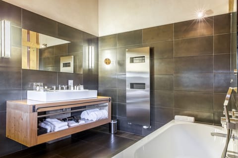 Deluxe Room | Bathroom | Separate tub and shower, deep soaking tub, rainfall showerhead