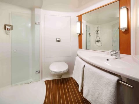 Shower, eco-friendly toiletries, hair dryer, towels