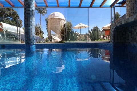 Indoor pool, sun loungers