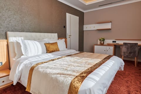 Deluxe Room | Premium bedding, memory foam beds, minibar, desk