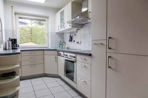 Apartment, 1 Bedroom | Private kitchen | Full-size fridge, oven, stovetop, dishwasher