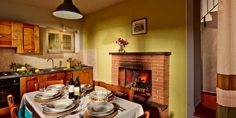  Big fully equipped family sized kitchen with fireplace for the colder months.