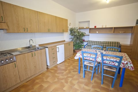 Apartment, 1 Bedroom (Mirto) | Private kitchenette | Fridge, stovetop, cookware/dishes/utensils