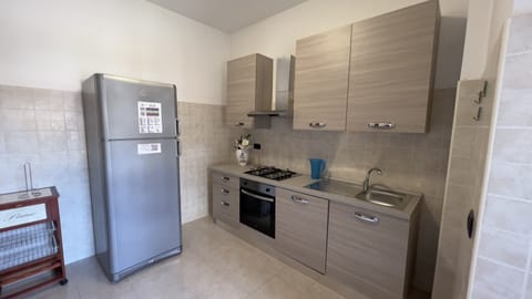 Apartment, 2 Bedrooms | Private kitchen | Fridge, microwave, oven, stovetop