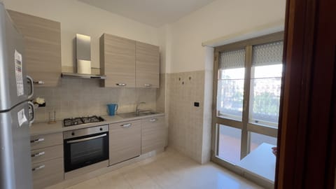 Apartment, 2 Bedrooms | Private kitchen | Fridge, microwave, oven, stovetop