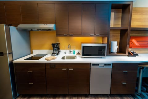 Studio Suite, 1 King Bed | Private kitchen | Fridge, microwave, stovetop, dishwasher