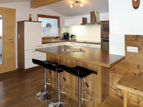 Cabinetry, Furniture, Property, Countertop, Table, Kitchen, Wood, Lighting, Interior Design, Kitchen Appliance