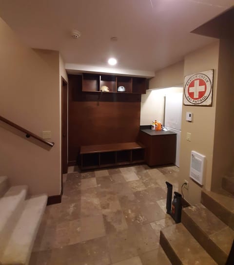 Mud Room: storage for ski boots and clothes. Ski boot dryers.