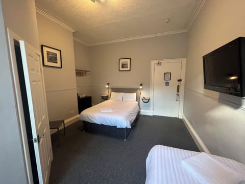 Double or Twin Room, Multiple Beds | Iron/ironing board, free WiFi, bed sheets