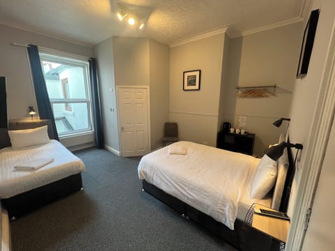 Double or Twin Room, Multiple Beds | Iron/ironing board, free WiFi, bed sheets