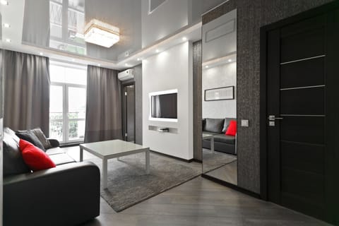 Deluxe Apartment | Living area | 40-inch flat-screen TV with cable channels, TV, Netflix