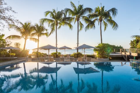 Outdoor pool, pool umbrellas, sun loungers