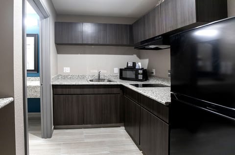 Room, 2 Queen Beds | Private kitchenette | Full-size fridge, microwave, coffee/tea maker