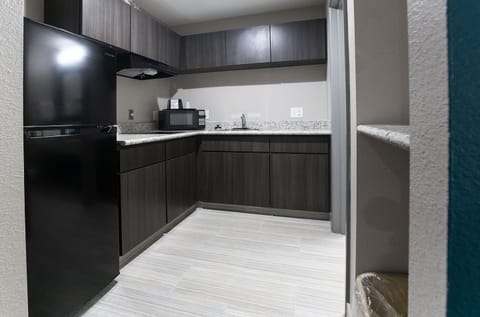 Room, 1 King Bed | Private kitchenette | Full-size fridge, microwave, coffee/tea maker