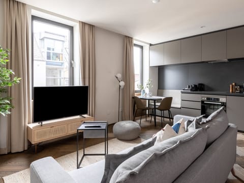One-Bedroom Suite M | Living area | Flat-screen TV