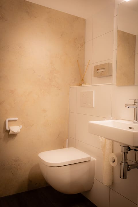 Family Quadruple Room | Bathroom | Shower, free toiletries, hair dryer, bathrobes