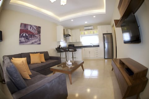 Apartment, 1 Bedroom | Living room | 42-inch LCD TV with satellite channels, TV