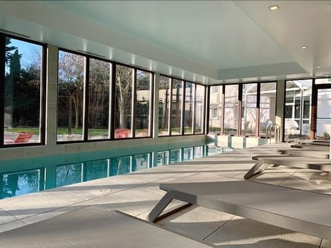 Indoor pool, seasonal outdoor pool, sun loungers