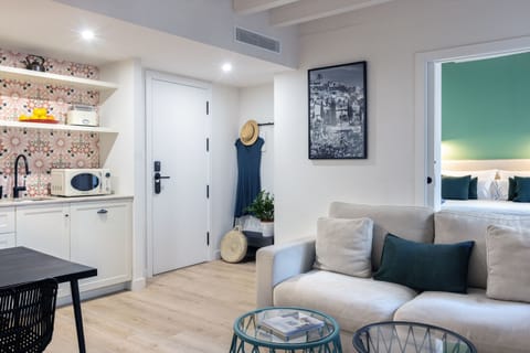 Superior Suite | Living area | Flat-screen TV
