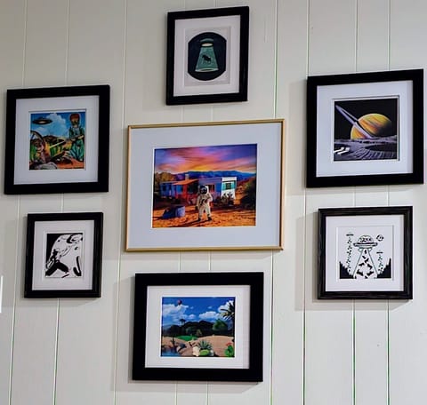 Explore vibrant desert landscapes in Snake Jagger's art collage.