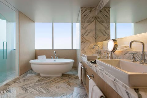 Junior Suite, 1 Bedroom | Bathroom | Shower, rainfall showerhead, hair dryer, bathrobes