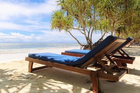 On the beach, sun loungers, beach umbrellas, 2 beach bars