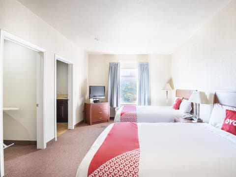 Premium Room, 2 Queen Beds, Kitchenette | Desk, iron/ironing board, free WiFi, bed sheets