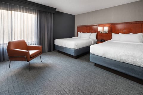 Suite, Multiple Beds | Premium bedding, in-room safe, desk, iron/ironing board
