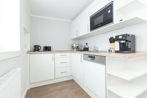 Apartment (Paris) | Private kitchen | Full-size fridge, microwave, stovetop, dishwasher