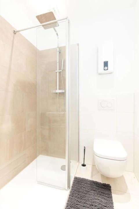Apartment (Beijing) | Bathroom | Shower, rainfall showerhead, hair dryer, towels