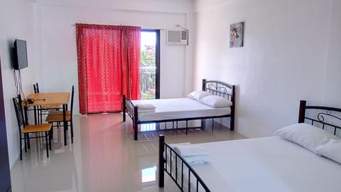 Deluxe Studio, 2 Queen Beds, Kitchenette, City View | Desk, laptop workspace, free WiFi, bed sheets