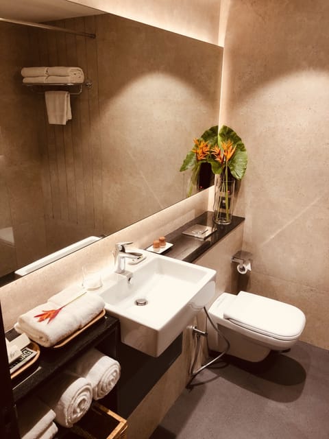 Executive Room.. | Bathroom | Shower, rainfall showerhead, designer toiletries, hair dryer