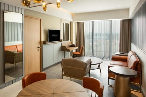 Suite Double Room (Breakfast) | Living room | 43-inch TV with digital channels