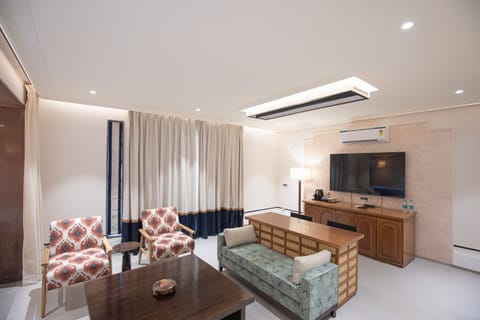 Presidential Room | Living area | Flat-screen TV