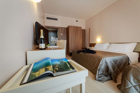 Comfort Triple Room, Balcony | Minibar, in-room safe, desk, free WiFi