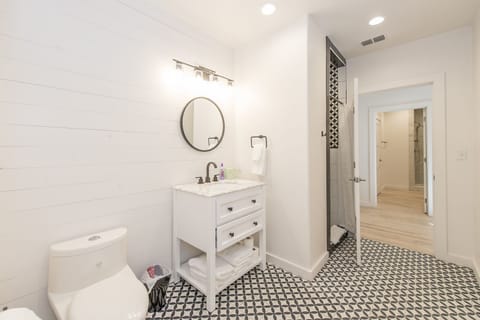 Modern Room 1 | Bathroom | Free toiletries, hair dryer, soap, shampoo